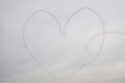 The Patrouille de France making a heart in the sky at Duxford The Battle of Britain Air Show