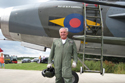 Squadron Leader Dennis Brooks standing in front of English Electric Lightning XS904/BQ at the 50th anniversary of the Lightning into service and the unveiling of the Lightning Q shed