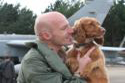 Flight Lieutenant Steve Morris and Jezebel the Spaniel at the RAF Tornados return from the Libya operations event