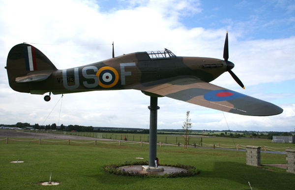 Gate guardian replica Hawker Hurricane Mk I V7313/US-F of RAF's 56 Squadron at North Weald Airfield