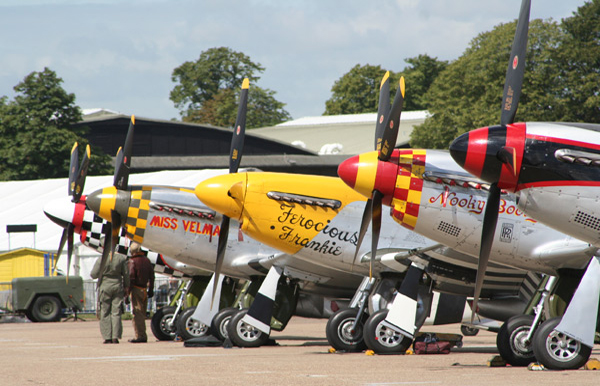 North American Aviation P-51 Mustang props in flightline walk at Duxford Flying Legends Air Show 2009